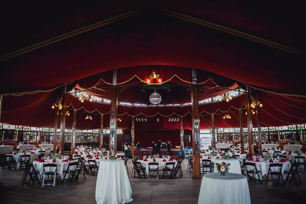 Spiegeltent wedding tent with a red velvet ceiling