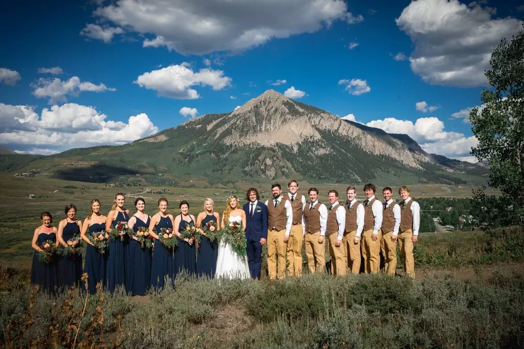 large wedding party for a Crested Butte wedding in the mountains
